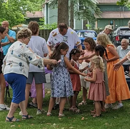 Children participating in an outdoor church activity